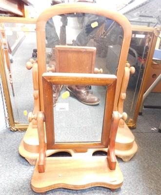 Lot 2093 - Two toilet mirrors, one being pine framed, the...