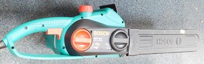 Lot 2099 - A Bosch AKE40S electric chainsaw, with oil, in...