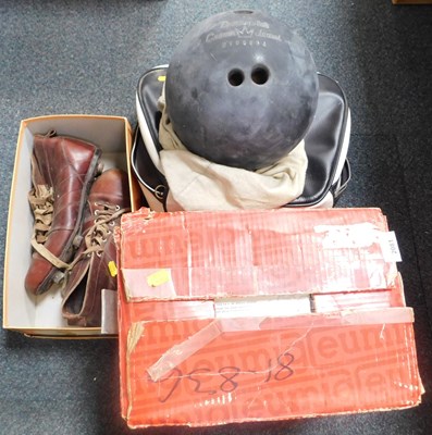 Lot 2081 - A pair of vintage football boots, a bowling...