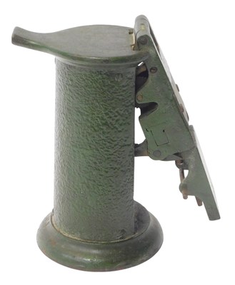 Lot 490 - A green painted cast metal railway ticket...