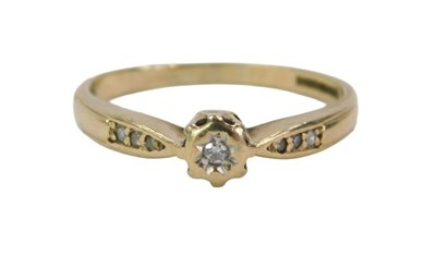 Lot 313 - An 18ct gold diamond solitaire ring, set with...