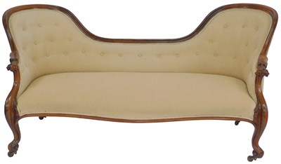 Lot 664 - A Victorian walnut double spoonback chaise,...