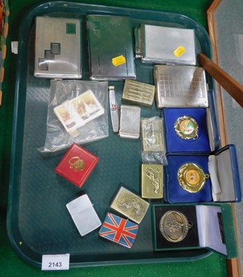 Lot 2143 - A selection of lighters and medallions,...