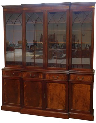 Lot 575 - A 20thC mahogany breakfront display cabinet,...