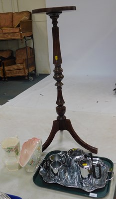 Lot 2157 - A mahogany torchere, raised on tripod supports,...