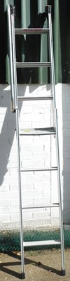 Lot 1129 - A set of aluminium loft ladders by Easy Way.