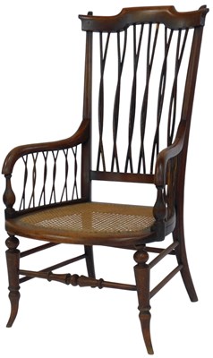 Lot 582 - A late 19thC fruitwood armchair, with a...