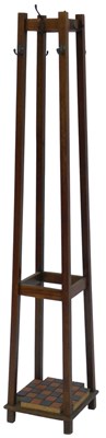 Lot 587 - An early 20thC oak coat stand, with metal...