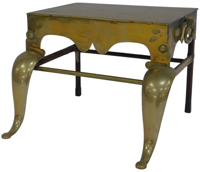 Lot 564 - A George III brass footman, 32cm high, 45cm...