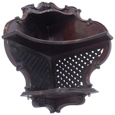 Lot 597 - An Edwardian mahogany corner wall hanging...