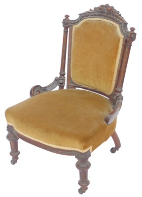 Lot 614 - A Victorian mahogany nursing chair, with a...