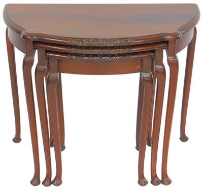 Lot 610 - A nest of three early 20thC mahogany bow front...