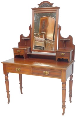 Lot 648 - An Edwardian walnut mirror back dressing table,...
