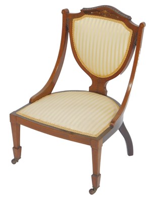 Lot 643 - An Edwardian rosewood and inlaid bedroom chair,...