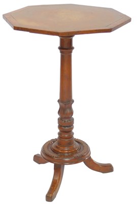 Lot 657 - A Victorian oak tripod table, the octagonal...