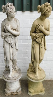 Lot 543 - A pair of painted composition stone figures,...