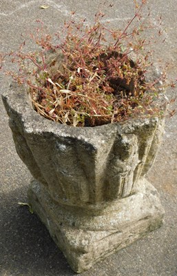 Lot 548 - A composition stone garden planter, of...