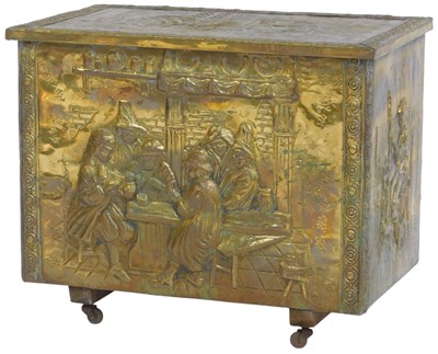 Lot 594 - An embossed brass coal box, decorated with...