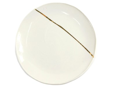 Lot 261 - A white glazed Studio ceramic plate, with...