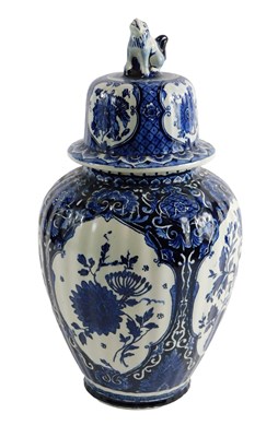 Lot 104 - A 20thC Delft by Boch jar and cover, on a blue...