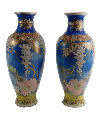 Lot 105 - A pair of 20thC Japanese vases, each on a blue...