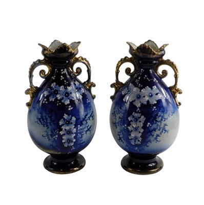 Lot 106 - A pair of 20thC vases, on a glazed blue and...