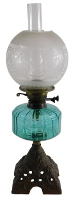 Lot 111 - A 20thC oil lamp, on a cast Art Nouveau style...