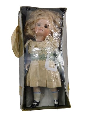 Lot 131 - A 20thC bisque headed miniature doll, with...
