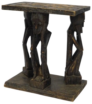 Lot 631a - An African carved and ebonised tribal...