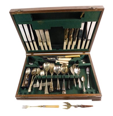 Lot 201 - An oak canteen, enclosing various silver...