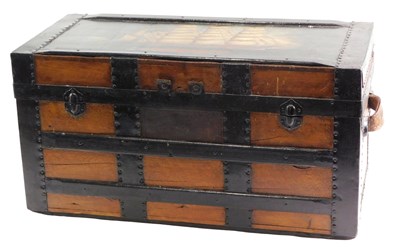 Lot 219 - A slatted wood trunk, the lid later painted...