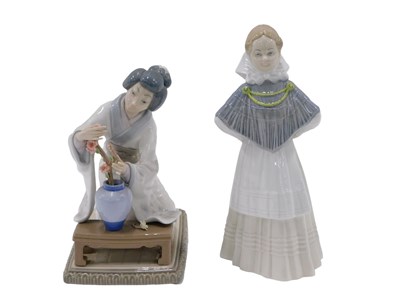 Lot 261 - A Capodimonte porcelain figure of an Oriental...