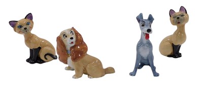 Lot 273 - Four Wade blow-up Lady and the Tramp figures,...