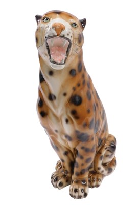 Lot 281 - A large ceramic cheetah or leopard, 60cm high.