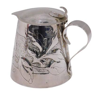Lot 62 - An Arts and Crafts silver plated lidded jug,...