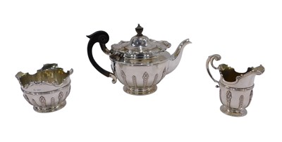 Lot 1 - An Edwardian silver three piece tea set, of a...