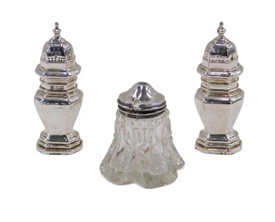 Lot 68 - A pair of George V silver pepperettes, of...