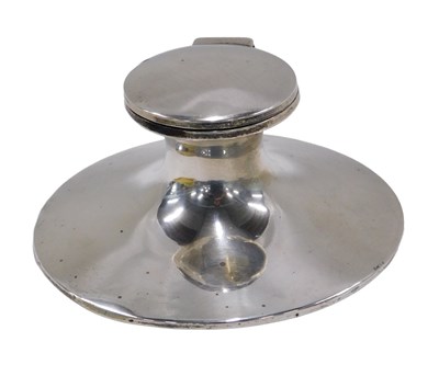 Lot 79 - A plain silver capstan inkwell, with ceramic...