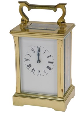 Lot 88 - A brass cased carriage clock, with white...