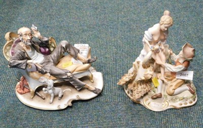 Lot 2007 - A ceramic ornament of a gentleman on chaise...