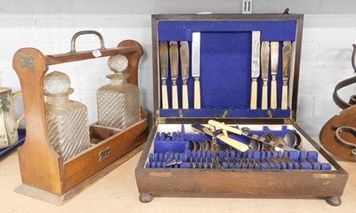 Lot 2017 - An oak cased canteen of cutlery, consisting of...
