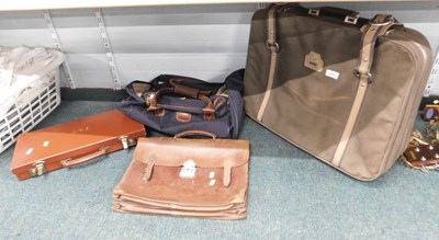Lot 2031 - A small leather briefcase, with brass fittings,...
