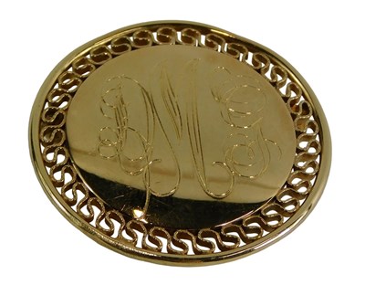 Lot 325 - A circular pin brooch, bearing the initials...