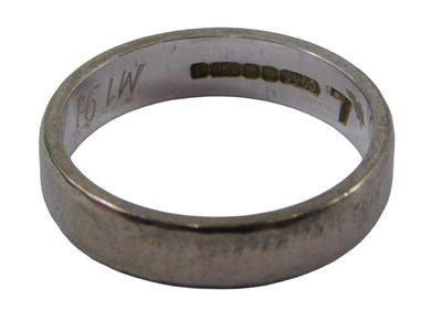 Lot 413 - An 18ct white gold wedding band, of textured...