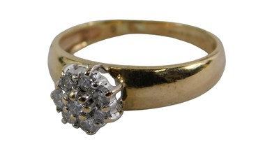 Lot 388 - A 9ct gold diamond cluster ring, the cluster...