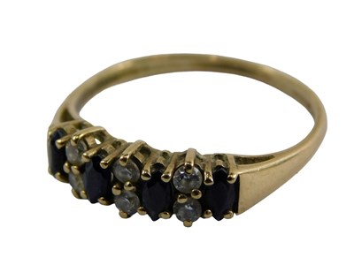 Lot 391 - A 9ct gold sapphire and diamond dress ring,...