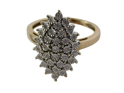 Lot 393 - A diamond set dress ring, the marquise head...