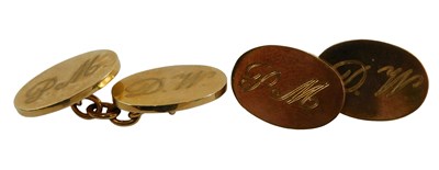 Lot 330 - A pair of 9ct gold oval cuff links, each...