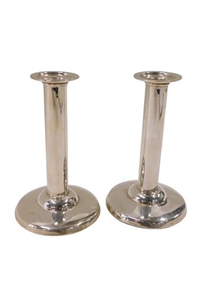 Lot 451 - A pair of George V plain silver candlesticks,...