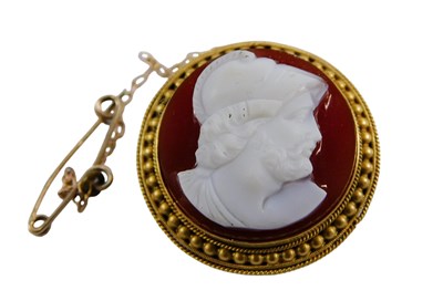 Lot 345 - A cameo brooch, of circular design, set with...